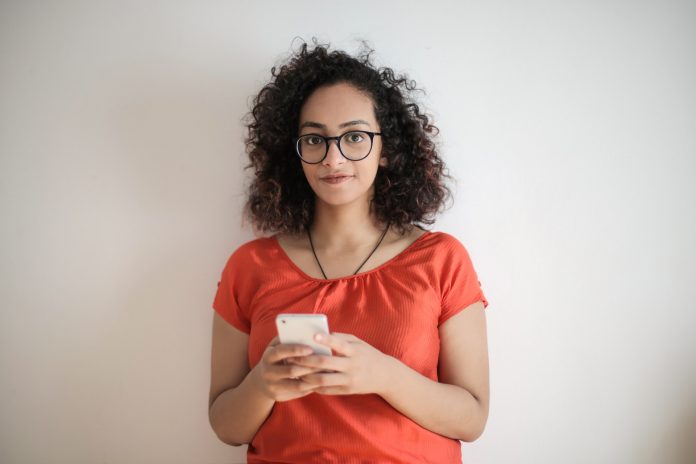 photo-of-woman-in-red-top-and-black-framed-eyeglasses-3762370